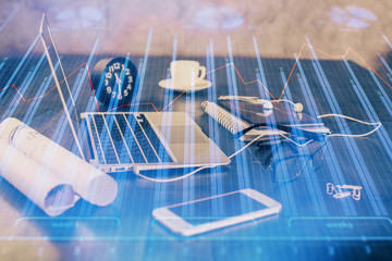 Double exposure of graph and financial info and work space with computer background. Concept of international online trading.