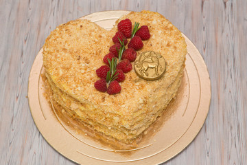 Beautiful birthday cake decorated with decor and fresh berries