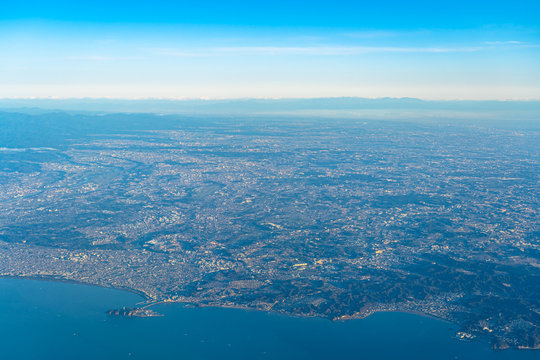 Aerial view of Shonan region in sunrise time with blue sky horizon background, Kanagawa Prefecture, Japan