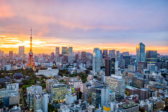 Cityscape of Tokyo skyline, panorama aerial skyscrapers view of office building and downtown in Tokyo in the evening. Japan, Asia.
