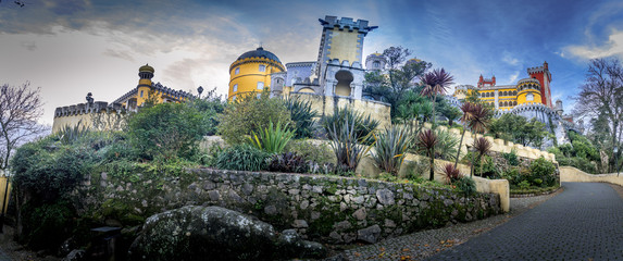 Stunning sunset panorama of Pena Palace in Sintra one of the seven wonders of Portugal