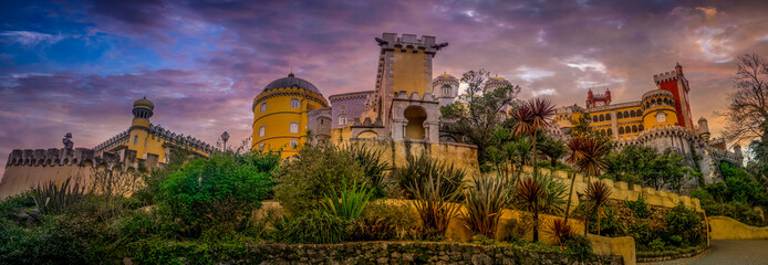Stunning sunset panorama of Pena Palace in Sintra one of the seven wonders of Portugal