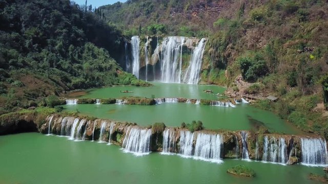 Aerial view drone flight above Jiulong waterfall in Luoping, Yunnan, China
