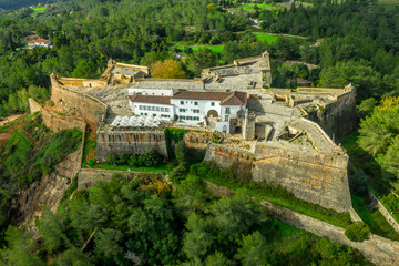 Fototapeta na wymiar Aerial view of fortress Sao Felipe in Setubal Portugal, star shaped military base protecting the city and the harbor with bastions