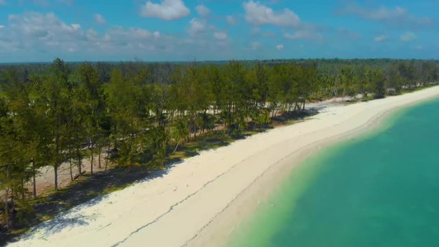 Endless empty white sandbar at Punta Sebaring in Balabac. 4K aerial landscape over Tropical Island in Palawan, Philippines