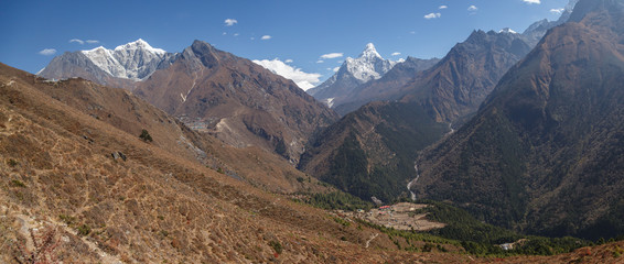 Mountain valley. Mount Ama Dablam. Almost cloudless sky.