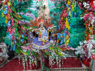 Lord Krishna swinging in a cradle on Krishna Janmashtmi