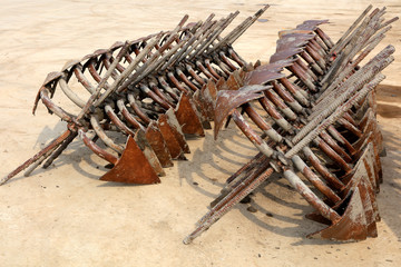 A pile of iron anchors
