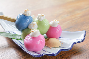 Mochi Japanese dessert is cute and tasty colorful on wood table