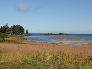Sand beach at the shore of Lake Vanern, Sweden.