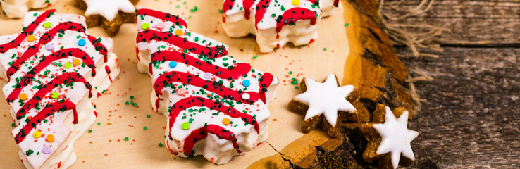 Christmas Tree Cakes on Wooden Background. Christmas Background. Selective focus.