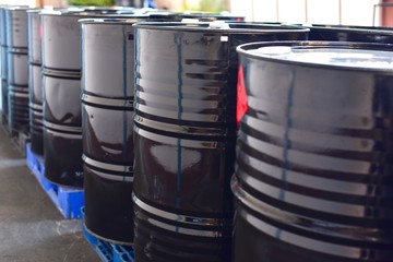 Black Steel Chemical Drums or Barrels on Pallets