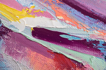 Fragment. Multicolored texture painting. Abstract art background. oil on canvas. Rough brushstrokes of paint. Closeup of a painting by oil and palette knife. Highly-textured, high quality details.