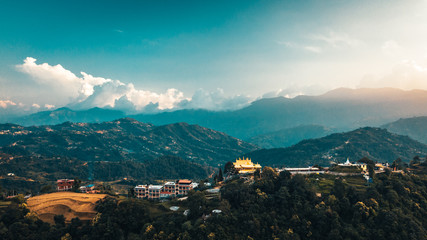 Ancient buddhist monastery in Himalayas Nepal from air