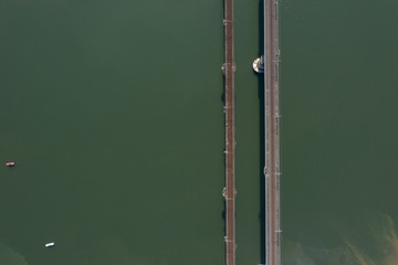 2 railway bridges across the green river top view