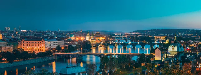 Rolgordijnen Prague, Czech Republic. Evening Panoramic View Of Evening Cityscape In Night Lighting. Charles Bridge, Manes Bridge, Straka Academy. Famous Landmarks, UNESCO World Heritage © Grigory Bruev