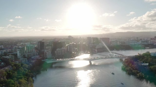 A drone shot of Brisbane city and the Captain Cook Bridge at sunset from Kangaroo Point. Brisbane, Australia.