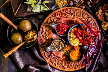 Top view Thai spices and herbs ingredient decoration on wood table for cook in home kitchen. 