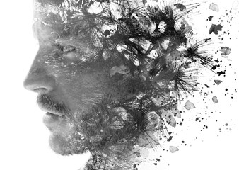 Paintography. Double exposure of an attractive male model combined with hand drawn paintings with lines and geometry
