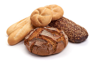 Different types of rustic bread, isolated on white background