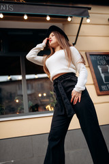 Young stylish woman in a city street