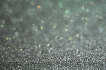 Beautiful Abstract Sparkle Glitter Lights Background. Deep Green Dark Emerald. Shine Bokeh Effect. For party, holidays, celebration. Good for New Year and Christmas Card