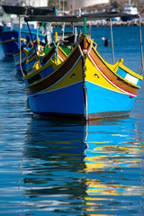 Fototapeta na wymiar Traditional colorful Izzu boat of Malta