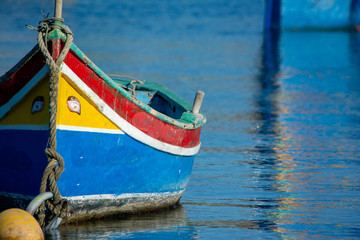 Obraz premium Traditional colorful Izzu boat of Malta
