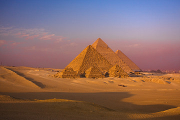 Fototapeta na wymiar scenic panorama view of giza pyramids cairo egypt with caravan 