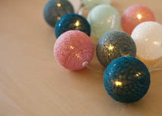 Christmas lights of trendy blue and white and pink colors, idea for home design
