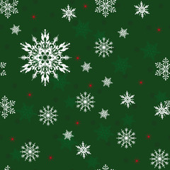Seamless pattern. White Snowflakes on a green background.