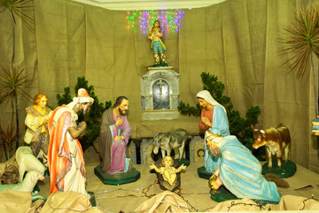 Christmas crib with manger in the center