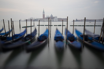 Gondolas docked in venice and San Giorgio Maggiore