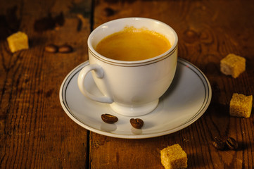 cup of coffee on wooden table