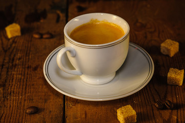 cup of coffee on wooden table