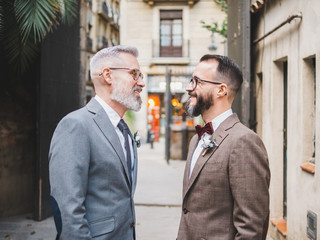 couple of two men on their wedding day, homosexuality concept, homosexual marriage