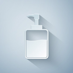 Obraz premium Paper cut Hand sanitizer bottle icon isolated on grey background. Disinfection concept. Washing gel. Alcohol bottle for hygiene. Paper art style. Vector Illustration