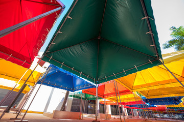 Low angle photo colorful event tents bright colors