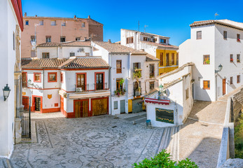 The picturesque Albaicin district in Granada on a sunny summer afternoon. Andalusia, Spain. - obrazy, fototapety, plakaty