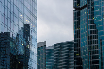 glass walls of skyscrapers with reflections in Moscow Russia