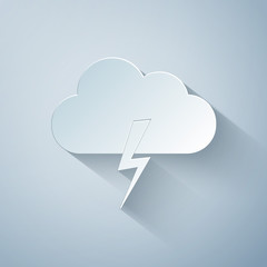 Paper cut Storm icon isolated on grey background. Cloud and lightning sign. Weather icon of storm. Paper art style. Vector Illustration