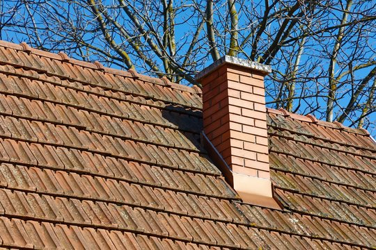 Chimney on a roof of a house