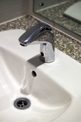 White bathroom sink and tap