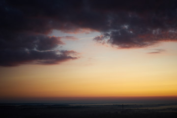 Fototapeta na wymiar sunrise in orange colours sity view