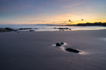 Fototapeta na wymiar Dawn of stunning colors on the beach!