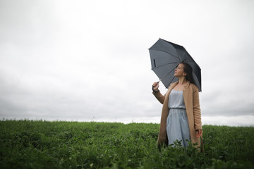 Young girl in a green park