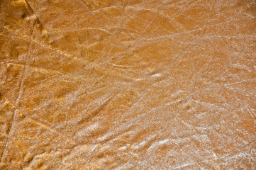 gold polished metal, steel texture. Gold foil background with light reflections. golden background. copy space. gold rumpled backdrop. metal, stainless steel texture background with reflection