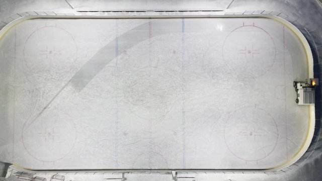 Aerial view of the ice resurfacer to clean and smooth the surface of a sheet of the ice rink