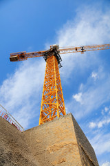Tower crane bracket for construction site
