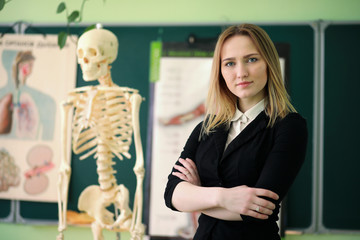 Young teacher in school class